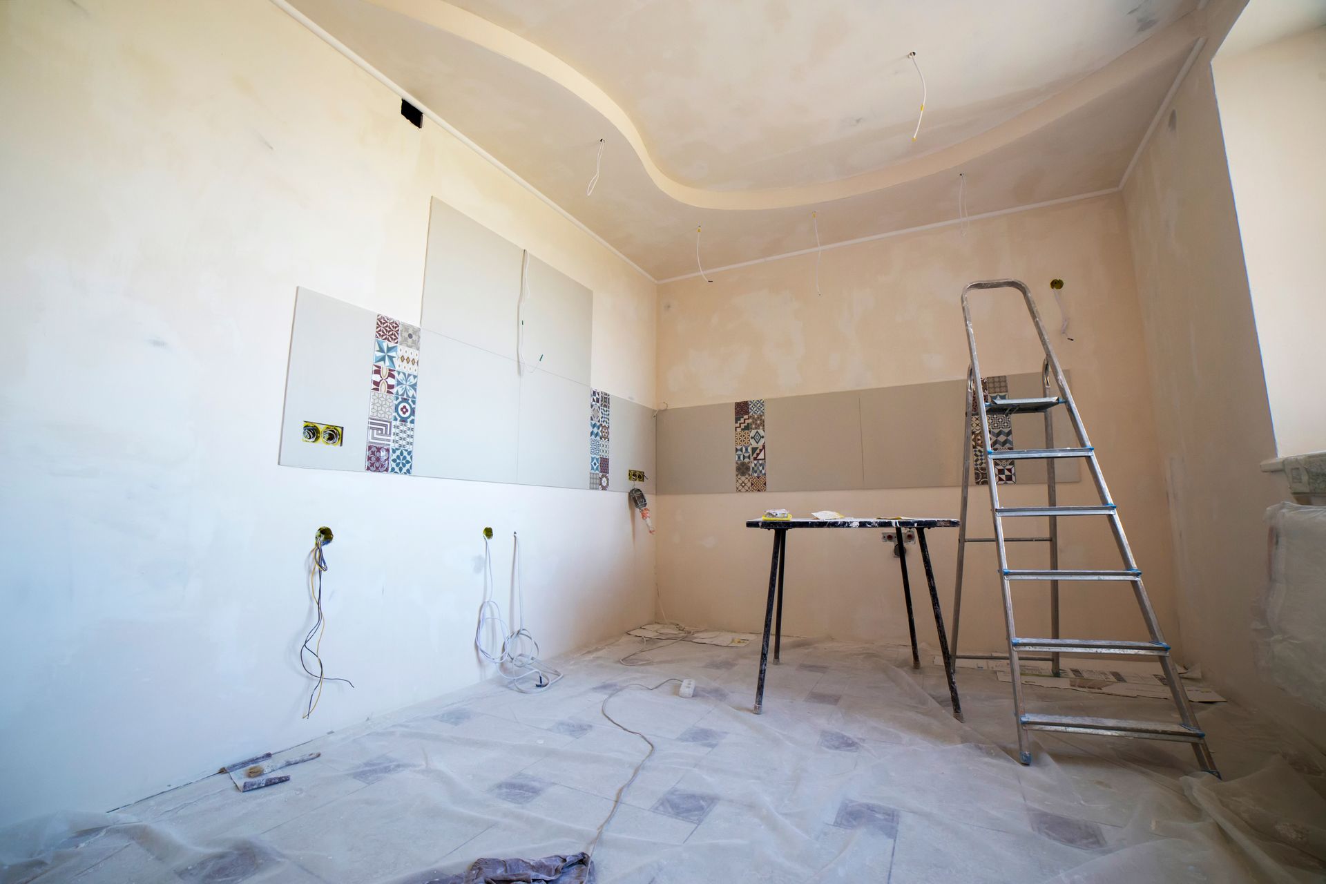 Residential room with fresh drywall during renovation